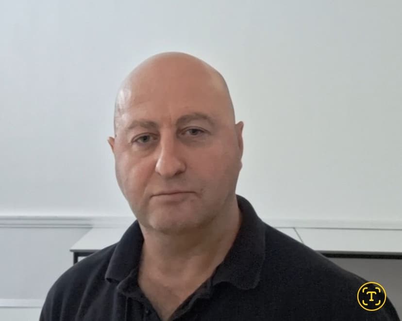 A portrait of the person featured on this page