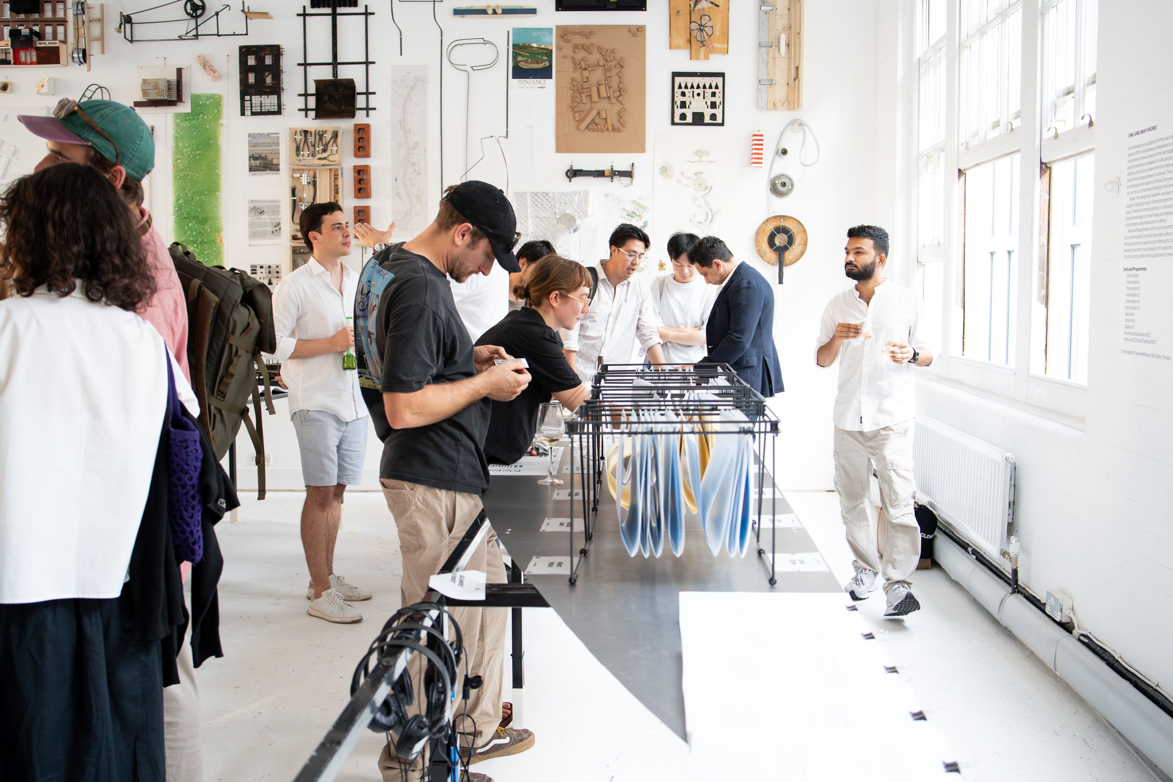 AA Projects Review Exhibition with visitors looking at work on display