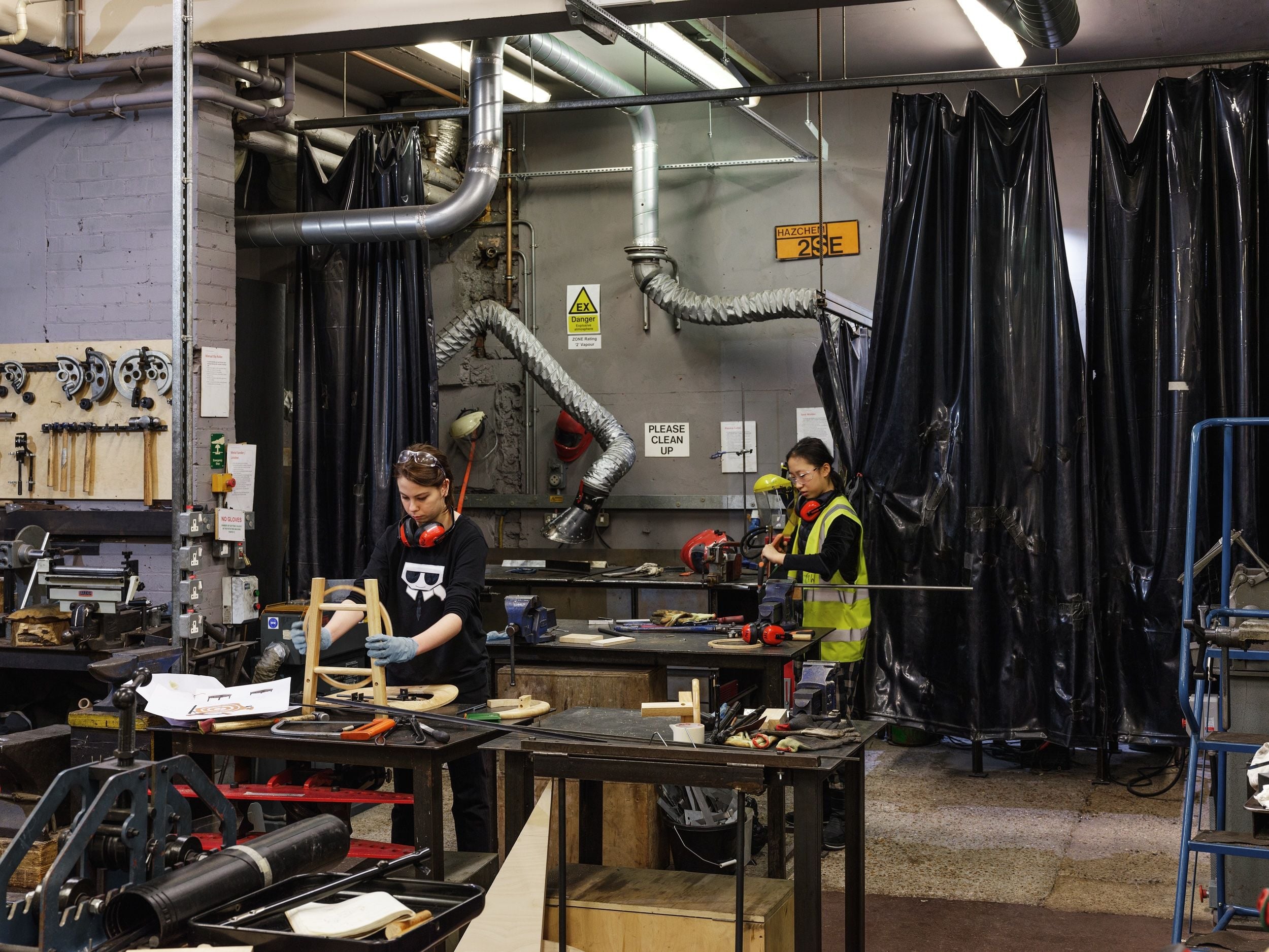 Two students in the Wood and Metal Workshop